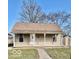 Charming one-story home with a quaint front porch and well-maintained landscaping at 607 S Pleasant St, Edinburgh, IN 46124