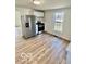 Kitchen with stainless steel refrigerator, and updated cabinets at 607 S Pleasant St, Edinburgh, IN 46124
