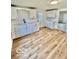 Well-lit kitchen featuring white cabinets, modern countertops, and durable vinyl flooring at 607 S Pleasant St, Edinburgh, IN 46124