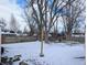Spacious backyard with a wooden fence at 611 Della Rd, Columbus, IN 47203