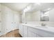 Bright bathroom featuring double sink vanity with quartz countertop and tile shower at 6724 Seattle Slew Dr, Whitestown, IN 46075