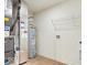 Utility room features a water heater, furnace, and wire shelving for storage at 6724 Seattle Slew Dr, Whitestown, IN 46075
