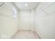 Spacious walk-in closet with carpet and wire shelving to maximize storage at 6724 Seattle Slew Dr, Whitestown, IN 46075