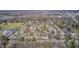 Aerial view showing close proximity of school and lake from this quiet and quaint neighborhood at 7943 Beaumont Green East Dr, Indianapolis, IN 46250