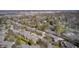 Aerial view of homes on tree-lined streets showing a beautifully maintained neighborhood with quiet streets at 7943 Beaumont Green East Dr, Indianapolis, IN 46250