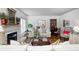 Spacious living room with fireplace, hardwood floors, and elegant decor at 7943 Beaumont Green East Dr, Indianapolis, IN 46250