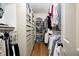 Spacious walk-in closet with built-in shelving and custom storage solutions at 7943 Beaumont Green East Dr, Indianapolis, IN 46250
