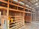 Inside the barn, featuring ample space for livestock, equipment, and storage at 8089 W Old State Road 67, Paragon, IN 46166