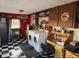 Laundry room with washer, dryer, checkered flooring, and built-in storage at 8089 W Old State Road 67, Paragon, IN 46166