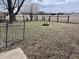 Backyard with a traditional fence, fire pit, and a grassy area at 810 S 400 W, Bargersville, IN 46106