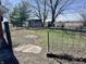 Backyard with a traditional fence, shed, and a grassy area at 810 S 400 W, Bargersville, IN 46106