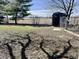 Backyard with a traditional fence, shed, and a grassy area at 810 S 400 W, Bargersville, IN 46106