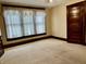 Bedroom with carpet, natural light from windows, and wood trim at 810 S 400 W, Bargersville, IN 46106