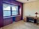 Bright bedroom featuring built-in desk, large window, and carpet flooring at 810 S 400 W, Bargersville, IN 46106