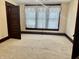 Bedroom with carpet, natural light from windows, and wood trim at 810 S 400 W, Bargersville, IN 46106