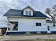 Two-story home with a covered front porch and classic architectural details at 810 S 400 W, Bargersville, IN 46106