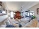 Bright living room with comfortable sectional, vaulted ceiling, and an open layout at 8318 Golden Ridge Ln, Indianapolis, IN 46237