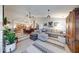 Inviting living area with vaulted ceilings, stylish furniture, and an open flow at 8318 Golden Ridge Ln, Indianapolis, IN 46237