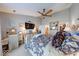Bright main bedroom featuring a ceiling fan and plenty of space to relax at 8318 Golden Ridge Ln, Indianapolis, IN 46237