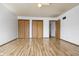 Spacious bedroom with hardwood floors and ample closet space at 847 Churchman Ave, Beech Grove, IN 46107