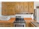 Kitchen area offering essential appliances and plenty of cabinet storage at 847 Churchman Ave, Beech Grove, IN 46107