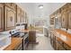 Functional kitchen with ample cabinet space and modern appliances for easy cooking at 847 Churchman Ave, Beech Grove, IN 46107