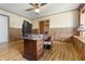 Office space with wood paneling and built-in desk at 847 Churchman Ave, Beech Grove, IN 46107