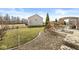Spacious backyard with patio, pergola, and landscaping provides an excellent outdoor living space at 8759 Buttonbush Cir, Plainfield, IN 46168