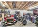 Unfinished basement area with exposed beams and a drum set at 8759 Buttonbush Cir, Plainfield, IN 46168