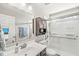 Bright bathroom with glass shower, vanity and neutral colors at 8759 Buttonbush Cir, Plainfield, IN 46168