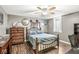 Bedroom with laminate flooring, neutral paint, and ceiling fan at 8759 Buttonbush Cir, Plainfield, IN 46168