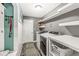 Laundry room with modern washer and dryer and storage at 8759 Buttonbush Cir, Plainfield, IN 46168