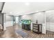 Recreational space with laminate flooring and a large aquarium at 8759 Buttonbush Cir, Plainfield, IN 46168