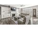 Cozy living room with fireplace, built-in shelves, large windows, and stylish furniture at 8759 Buttonbush Cir, Plainfield, IN 46168