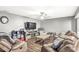 Spacious living room features laminate flooring and neutral colors at 8759 Buttonbush Cir, Plainfield, IN 46168