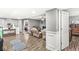 Finished living space with laminate flooring, neutral paint, and recessed lights at 8759 Buttonbush Cir, Plainfield, IN 46168