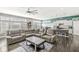 Open-concept living space with lots of natural light, modern furniture, and stylish decor at 8759 Buttonbush Cir, Plainfield, IN 46168