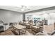Finished living room with recessed lighting, neutral paint, and theater seating at 8759 Buttonbush Cir, Plainfield, IN 46168