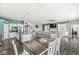 Open floorplan with a large kitchen island, a cozy dining area, and a comfortable living room at 8759 Buttonbush Cir, Plainfield, IN 46168