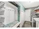 Mud room with bench seating, hooks, and laundry access at 8759 Buttonbush Cir, Plainfield, IN 46168
