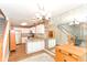 Well-lit kitchen with white cabinets, stainless steel appliances, and granite countertops at 915 Prestwick Dr # D, Indianapolis, IN 46214