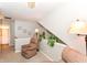 A cozy space shows comfortable seating, plants, soft lighting, and tranquil ambience at 915 Prestwick Dr # D, Indianapolis, IN 46214