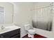 Simple bathroom with a tub and shower combination, and a single sink vanity at 10890 Poppy Hill Dr, Indianapolis, IN 46234