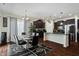 Eat-in kitchen features a stylish dining area and dark wood cabinetry at 10890 Poppy Hill Dr, Indianapolis, IN 46234