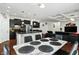 Open concept kitchen and dining area with a seamless transition to the cozy living room at 10890 Poppy Hill Dr, Indianapolis, IN 46234
