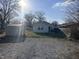 Backyard view shows an outdoor shed, well-kept yard with an outdoor grill and partial view of a boat at 1133 S Kealing Ave, Indianapolis, IN 46203