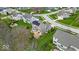Aerial view of the property showing the house, decks, landscaping, and surrounding neighborhood at 11367 Zanardi Ct, Zionsville, IN 46077