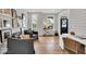 Comfortable living room featuring shiplap walls and natural light at 11367 Zanardi Ct, Zionsville, IN 46077