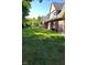 Spacious backyard showing large yard and patio area with view of backyard and fence at 11691 Diamond Pointe Ct, Indianapolis, IN 46236