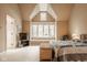 Bedroom featuring a large window, neutral colors, and comfortable furnishings at 11691 Diamond Pointe Ct, Indianapolis, IN 46236